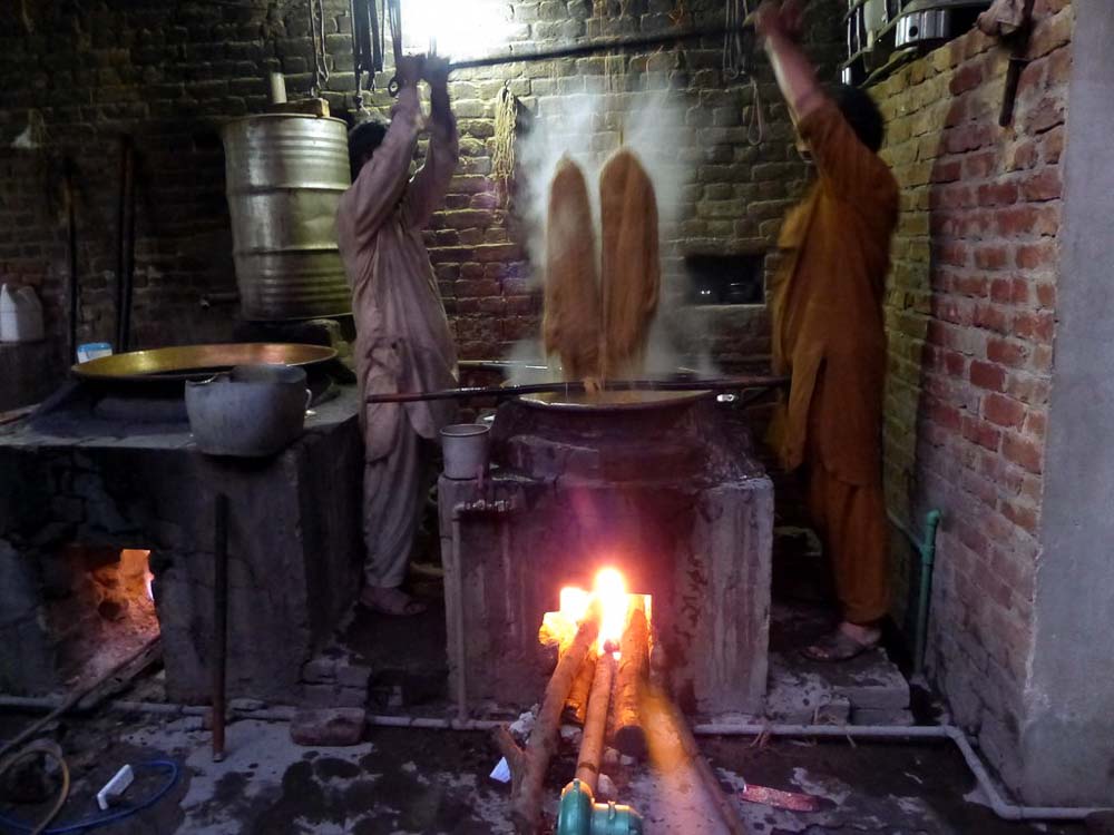a wood fired vat in Anayat's workshop